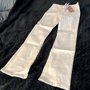 White boot cut jeans…never worn